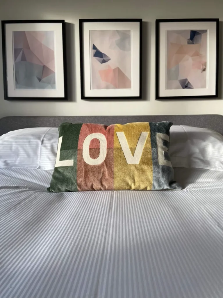 Master bedroom with double bed, soft lighting, and modern décor.