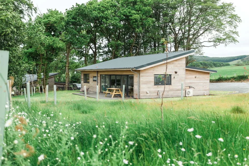 Ocean Drive lodge exterior with panoramic countryside views.