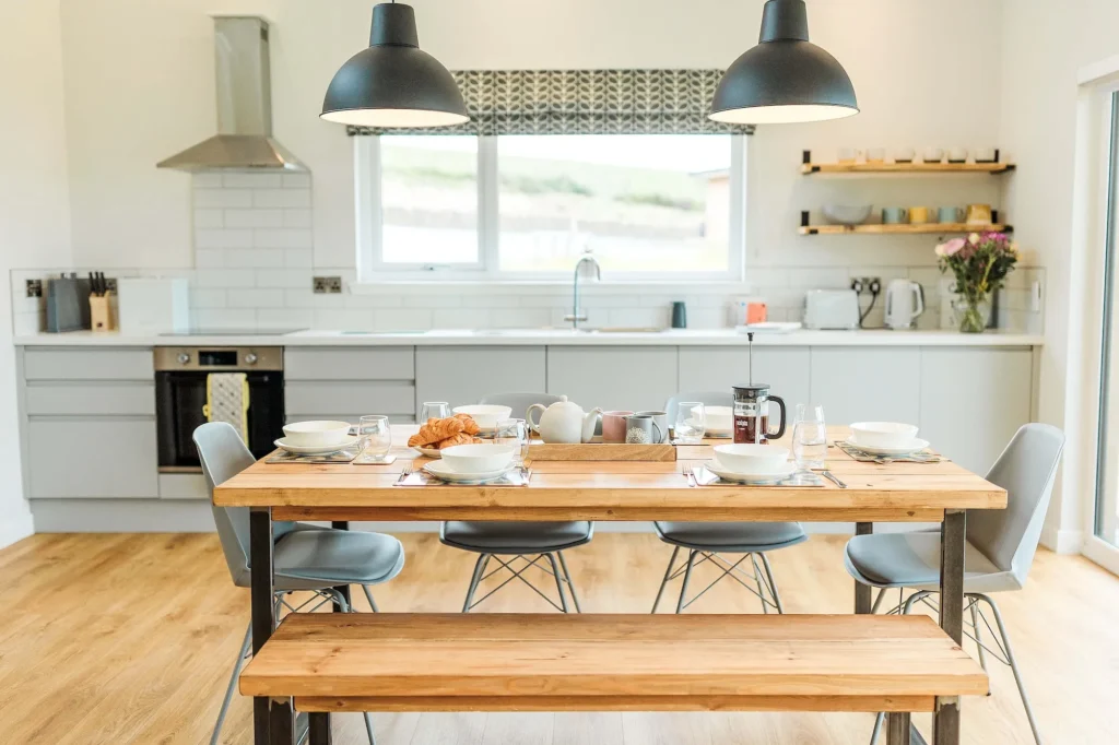 Bright open-plan kitchen and dining area inside a luxury lodge in Dumfries and Galloway