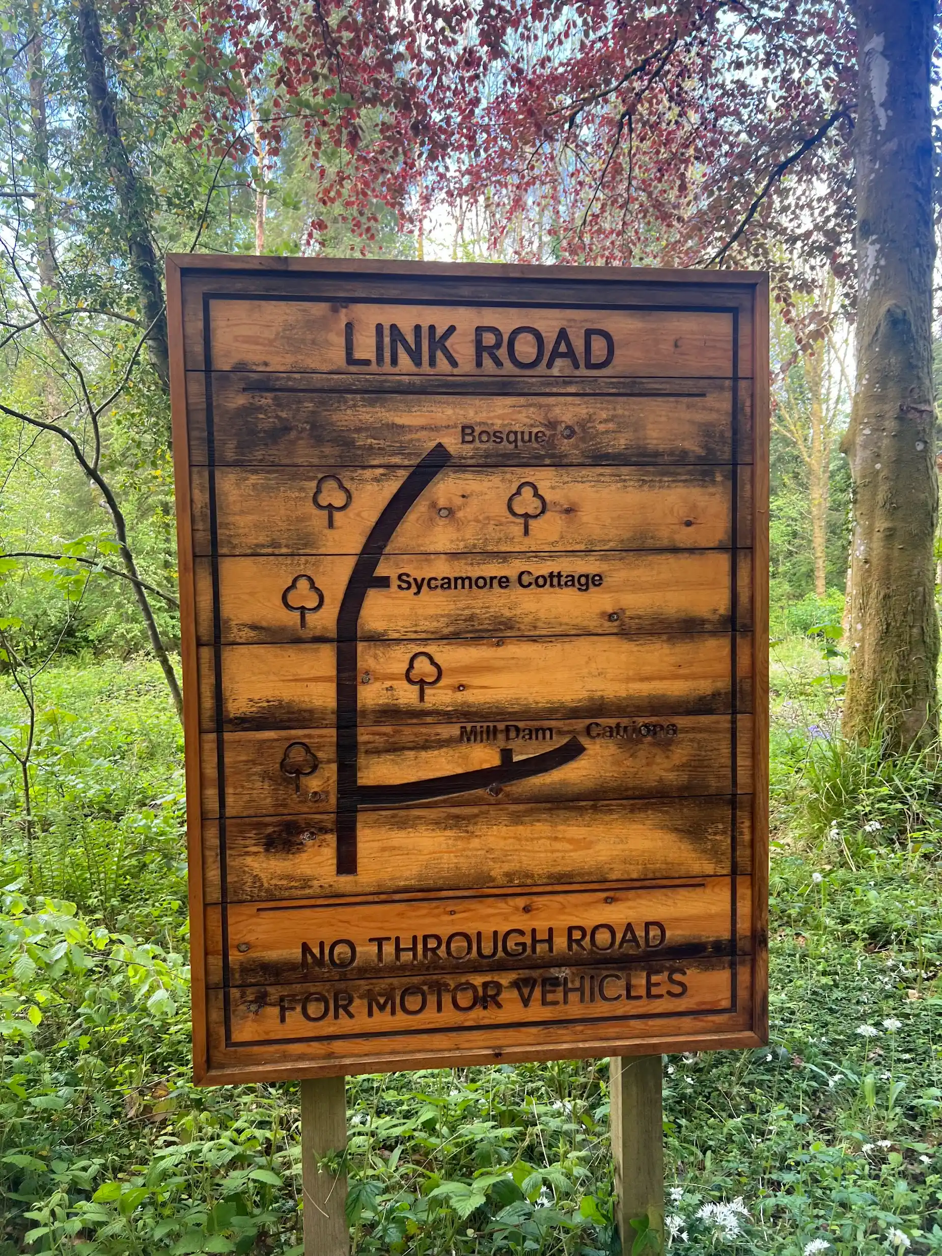 The Link Road sign in Cally Woods — the route back into Gatehouse of Fleet