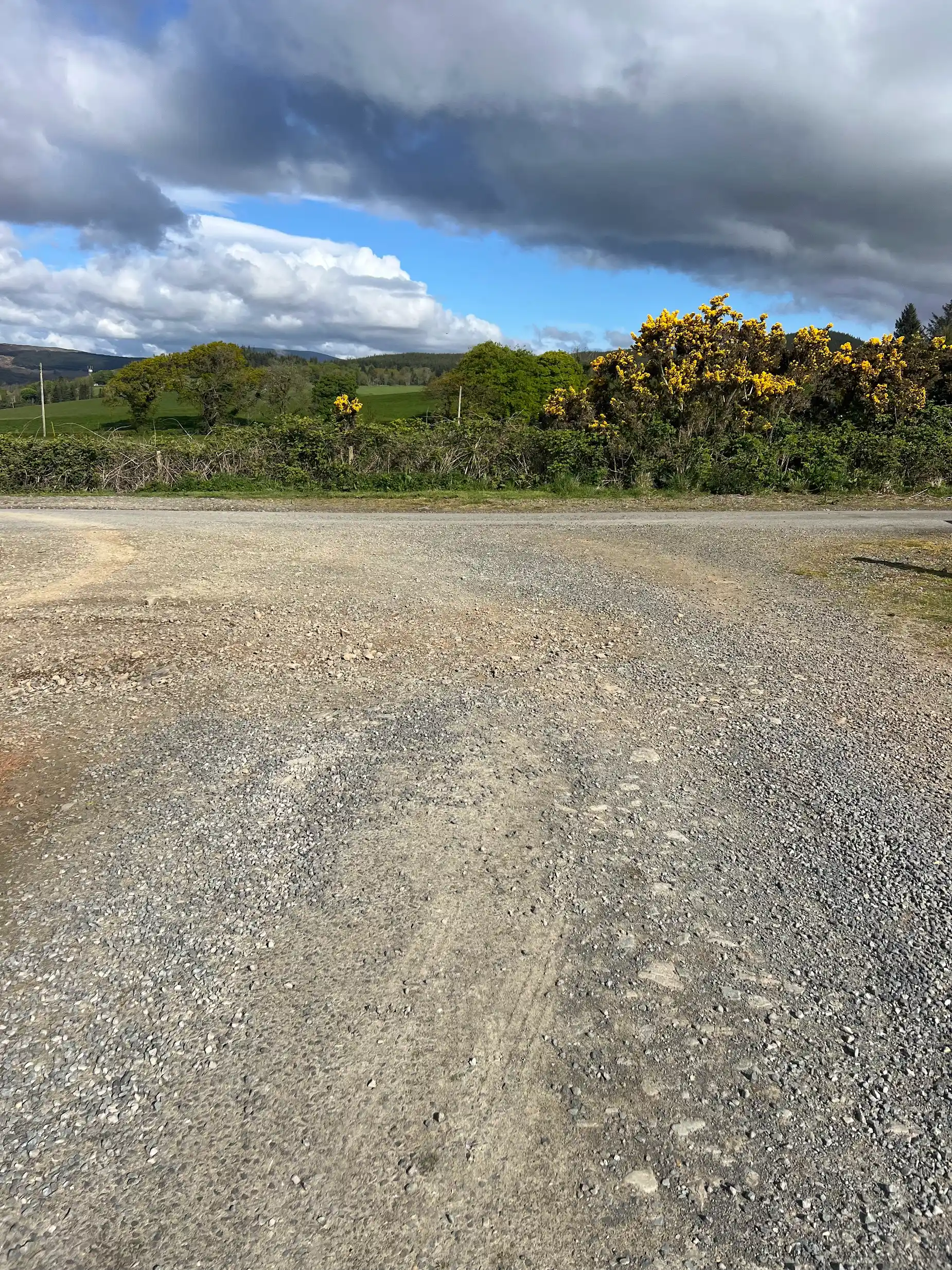 The bottom of the lodge drive looking out over open countryside toward Gatehouse of Fleet